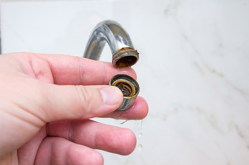 how to remove calcium buildup in pipes